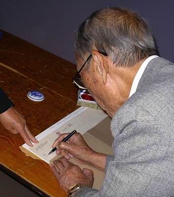Imprinting the seal on the Sumi-e Artists of Canada registry