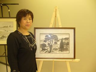 Fumiko Kumagai beside her graduation painting