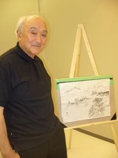 Tokugi Suyama beside his graduation painting