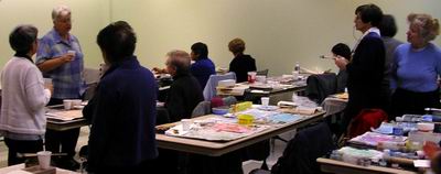 Participants begin working on their own treated paper