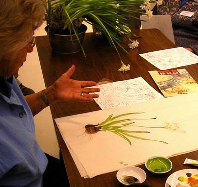 Additional stems and details fill out painting