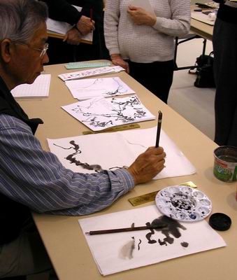 Secondary brush stroke of a fine, spindly vine about the branch