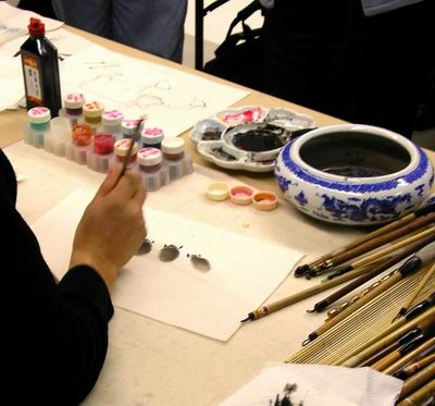 Demonstrating painting piglets