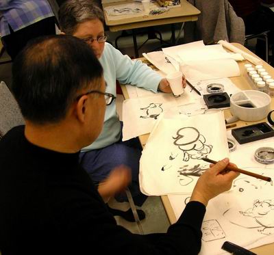Baoxing Zhange shows how to paint the pig from the back view