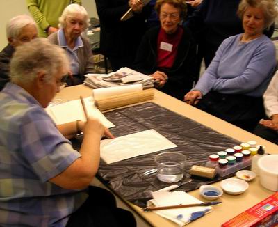 Hake brush used to wet paper