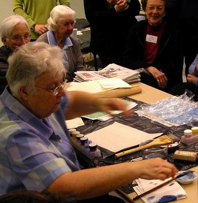 Creating a second treated paper with two colours