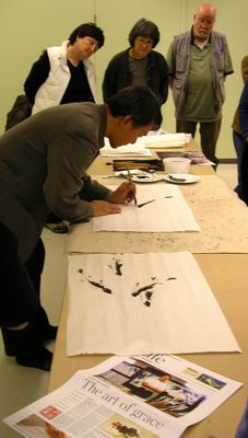 William Ho creates a second painting of fish