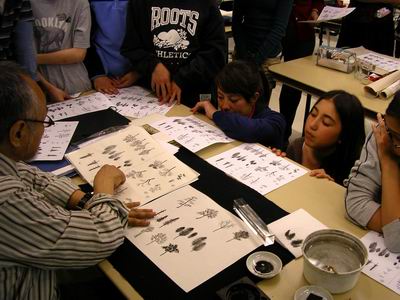 Hiroshi Yamamoto compares his trees to others drawn for a handout
